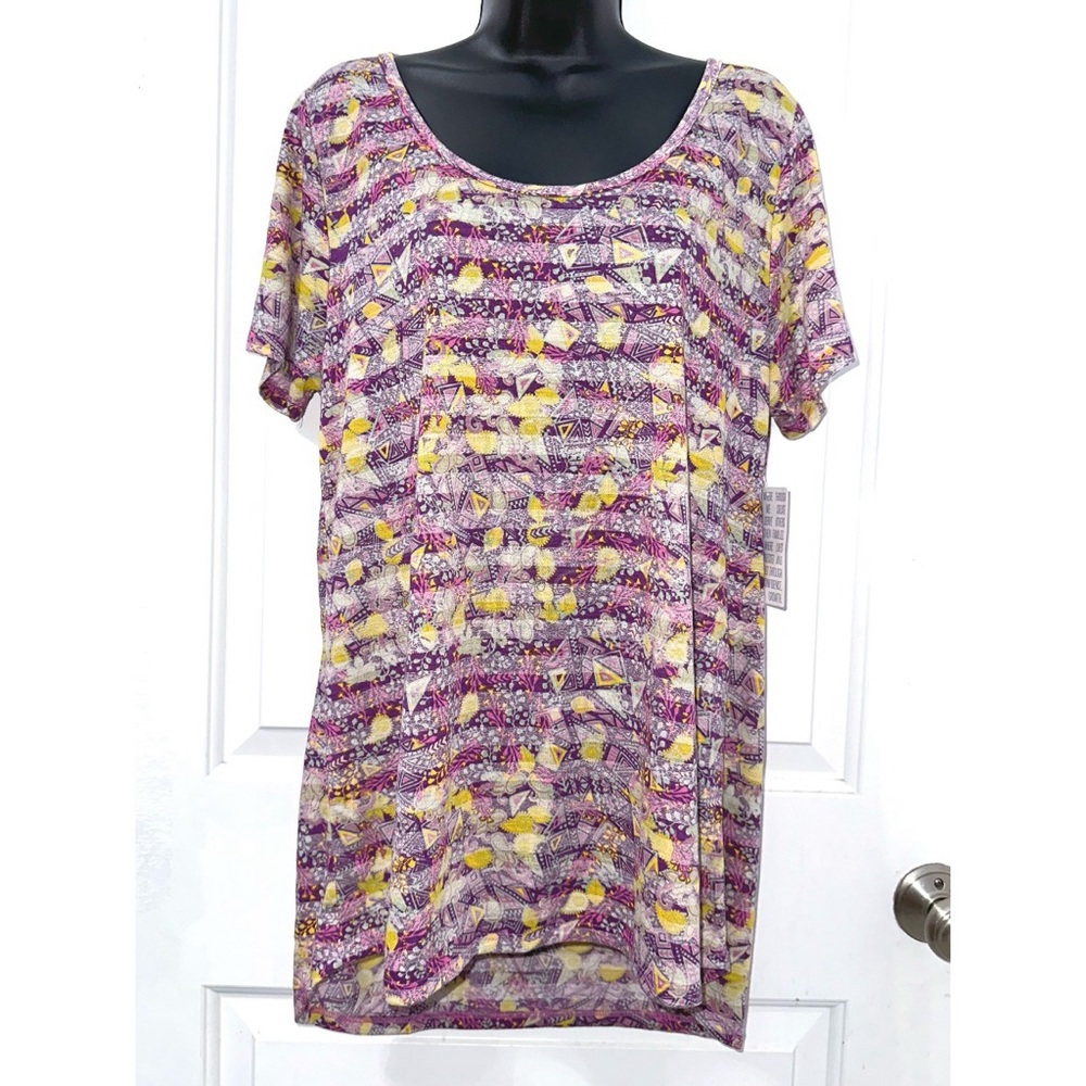 LuLaRoe Classic T-shirt in a purple, yellow, and white geometric pattern